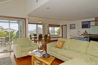 Open plan living, dining, kitchen. Paku in background.