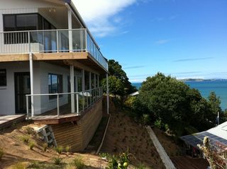 Day: Final house & land stabilisation & repair/replacement solution construction completed. Geotechnical, Design & Contract Administration work by Actionplans Ltd in conjunction with ISPS Ltd Engineers.